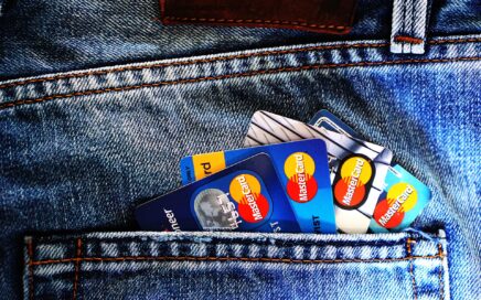 Image of credit cards sticking out of denim back pocket by TheDigitalWay from Pixabay