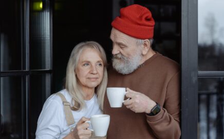 Photo of seniors in front of home courtesy MART PRODUCTION from Pexels