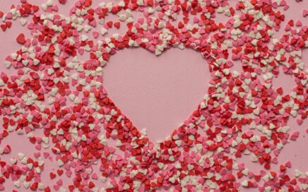 Photo of a heart shape using heart candies by Monstera from Pexels