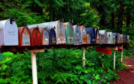 Image of a row of different coloured mailboxes courtesy of Brigitte Werner from Pixabay