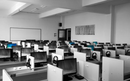 Photo of room full of cubicles courtesy Pixabay
